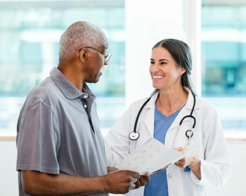 doctor reviewing test results with patient